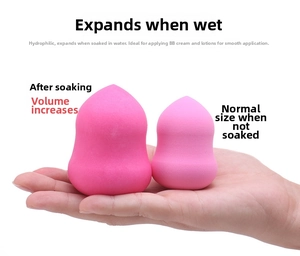 Pink makeup sponge showing wet and dry size comparison with hydrophilic material