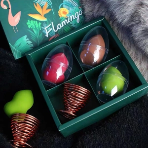 Beauty sponge set with 4 colorful eggs and metal holders in a flamingo themed box