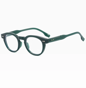 Detail of dark green round sunglasses with transparent frame and metal star on the temple