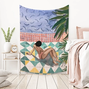 Detail of bohemian tapestry featuring watercolor illustration of a woman by a pool