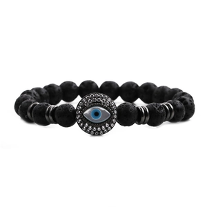 Men's adjustable lava stone bead bracelet with a skull and zircon evil eye design