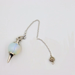 Macro shot of 18mm opal stone pendulum pendant with silver hollow bead and chain