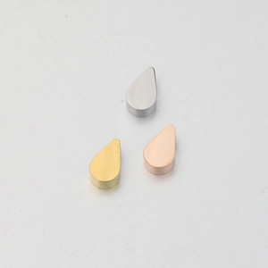 Polished stainless steel teardrop pendants in silver, gold, and rose gold finishes