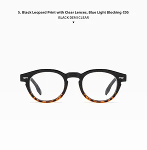 Close-up of black and tortoiseshell blue light blocking glasses with transparent lenses
