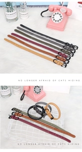 Detailed flat lay of adjustable PU leather pet collars in six colors with matte black hardware