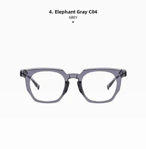 Detailed view of the elephant grey thick acetate frame with metal rivet accents