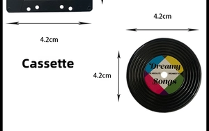 Detail view of vintage style 4.2cm cassette tape and vinyl record magnets with white background