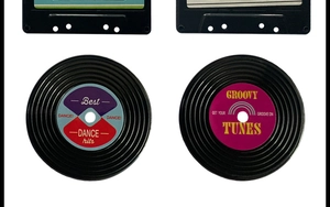 Macro shot of two vintage vinyl record coasters with non-slip texture and retro labels