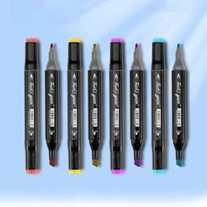 Dual-tip markers with broad and fine nibs in a 48-color professional art set