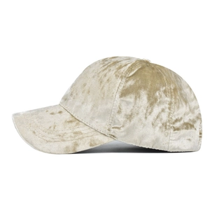 Macro side view of champagne velvet texture and stitching on an autumn baseball cap
