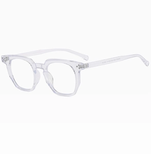 Detail view of transparent retro square eyeglass frames with silver metal rivets