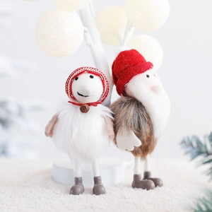 Christmas handmade wool felt snowman and santa dolls holiday decor with warm light