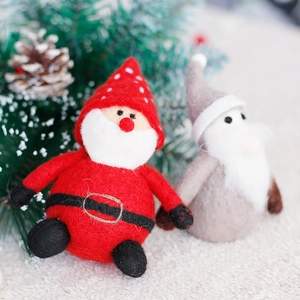 Nordic style Christmas wool felt Santa and gnome dolls for festive tabletop decoration