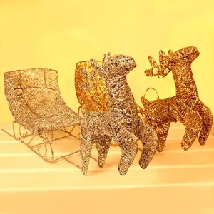 Piccolo set natalizio con renne e slitta in metallo con glitter oro e argento