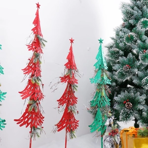Red and green star-topped Christmas tree ornaments for mall display and lobby decor
