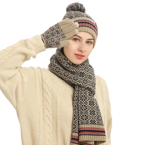 Winter khaki knitted set with hat, scarf and gloves featuring jacquard pattern