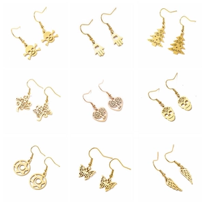 Golden lotus and tree of life earrings set in various laser-cut hollow designs