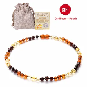 Natural Baltic Amber baby necklace with gradient beads, linen pouch and certificate
