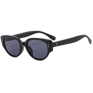 Fashionable black cat-eye sunglasses with silver rivets and dark UV-protective lenses