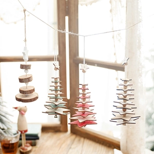 Handcrafted layered wooden Christmas tree ornaments with beads and hemp rope decor