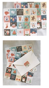 Christmas advent calendar stickers with 25 numbered illustrations on white envelopes