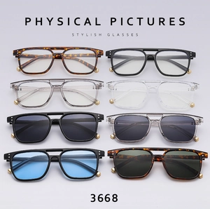 Detailed grid view of assorted double-bridge sunglasses with multiple frames and colors