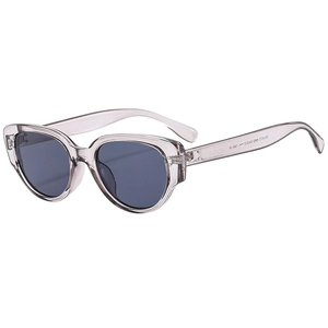 Modern cat eye sunglasses with light gray transparent frame and dark gray lenses