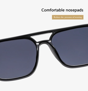 Detail of square double-bridge sunglasses with comfortable integrated nose pads