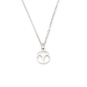 Detailed view of silver polished stainless steel necklace with laser cut zodiac pendant