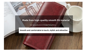 Detail of red PU leather wallet featuring white stitching and floral metal clasp
