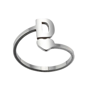 Detailed macro view of silver open ring featuring a polished letter D and heart charm