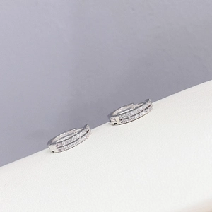 Elegant silver double-row zircon hoop earrings with a minimalist hinged snap closure