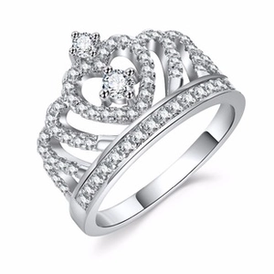 Macro detail of silver crown ring featuring intricate micro-pave set sparkling cubic zirconia