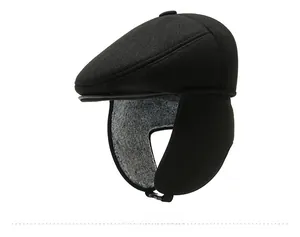 Detail view of winter flat cap with earmuffs and warm grey fleece lining in black