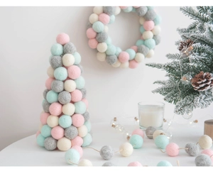 Macro view of macaron wool felt ball Christmas tree ornaments for Nordic home decor