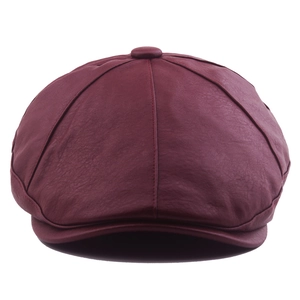 Classic burgundy PU leather newsboy cap in retro British style on white background