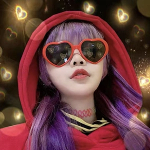 Close-up of red heart-shaped sunglasses with romantic glowing heart light effects