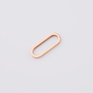 Close-up of polished rose gold oval-shaped titanium steel earring hoops for DIY jewelry