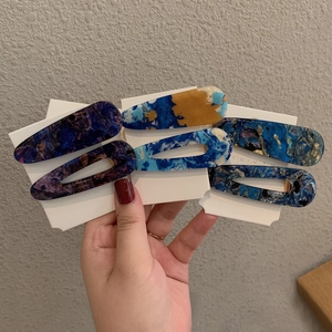 6-piece colorful marble acrylic rectangular and teardrop hair clips on white card