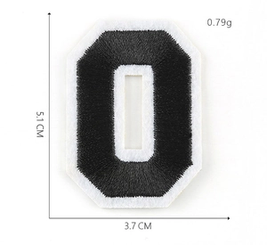 Detail view of number 0 embroidered patch in black and white with size measurements