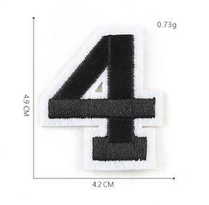 Detailed view of black number embroidery patch showing size 4.9x4.2cm on white background