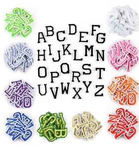 Detailed view of colorful A-Z embroidered alphabet patches for DIY apparel and clothing
