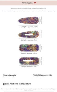 Detail view of purple and yellow marble acrylic hair clips with precise measurements