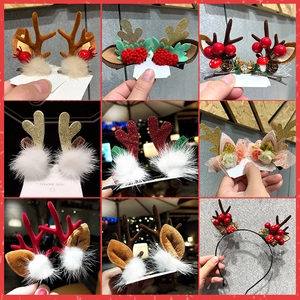 Set of Christmas reindeer antler hair clips and headbands with festive floral decorations