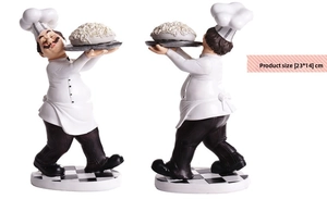 Front and back detail of a resin chef figurine holding pasta, size 23x14 cm