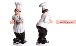 Front and side view of resin chef figurine holding a tray and teapot for restaurant decor