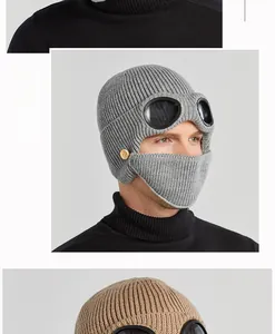 Close-up of gray knit aviator beanie with goggles and detachable matching face mask
