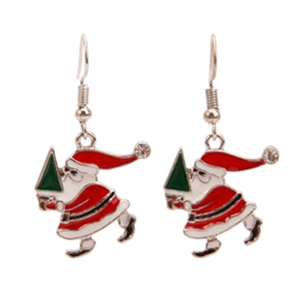 Close-up of Santa Claus enamel earrings with green Christmas tree and tiny rhinestones