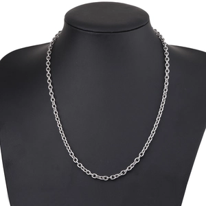 Polished silver stainless steel link chain necklace on a black mannequin bust