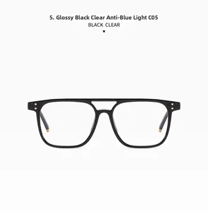 Detail of square double-bridge black frames with anti-blue light clear lenses and silver rivets